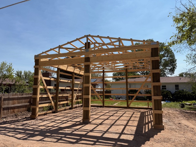 Pole barn framing structure under construction