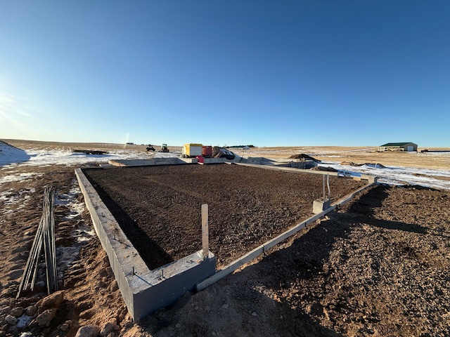 Concrete slab being prepared and poured